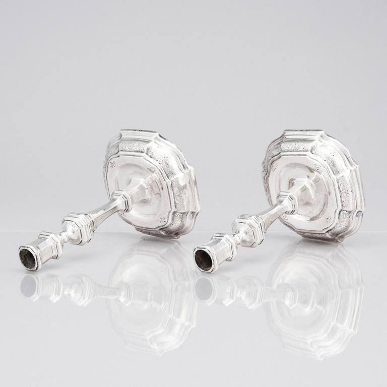 A pair of Swedish early 18th century silver candlesticks, mark of Petter Ersson Lund, Stockholm 1727.