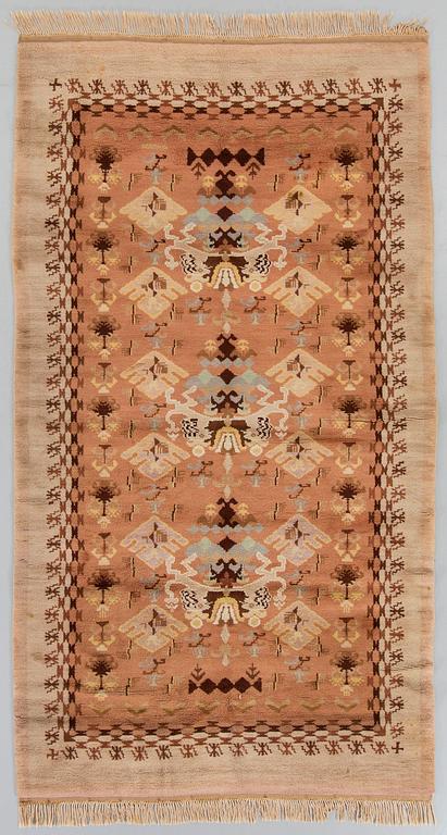 A Scandinavian knotted pile rug  1940/50 ca 303 x 169 cm.