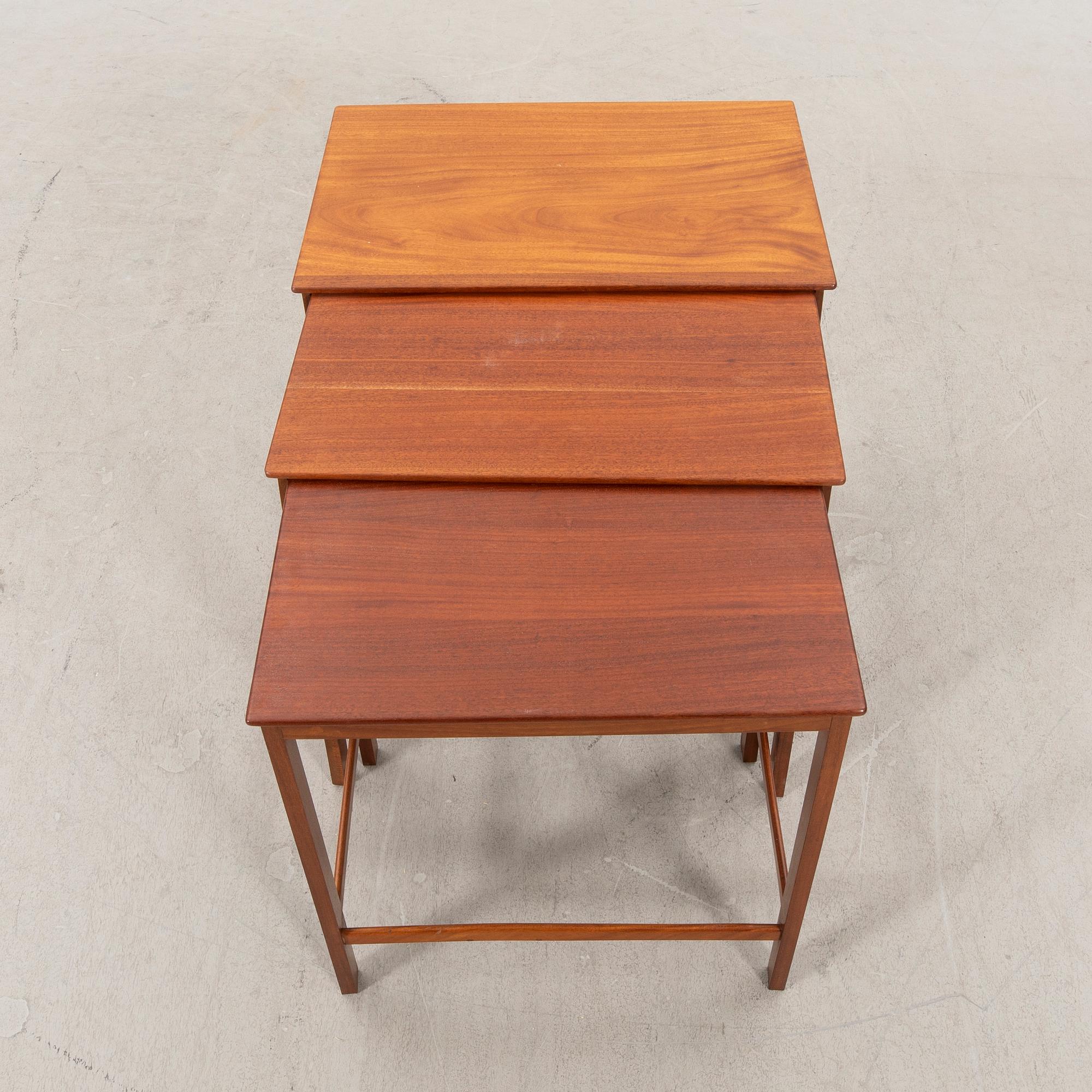 Jacob Kjaer, a mahogany nesting table later part of the 20th century.
