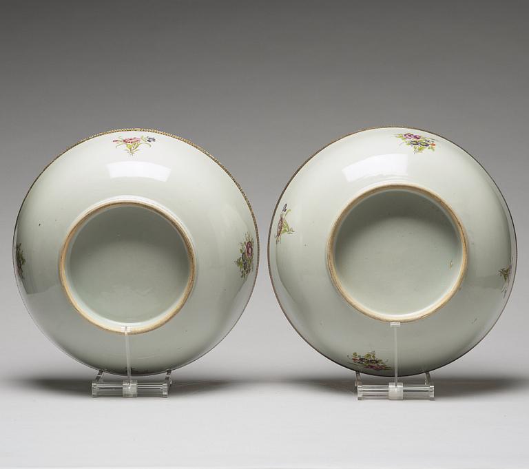 A pair of famille rose punch bowls, Qing dynasty, 18th Century.