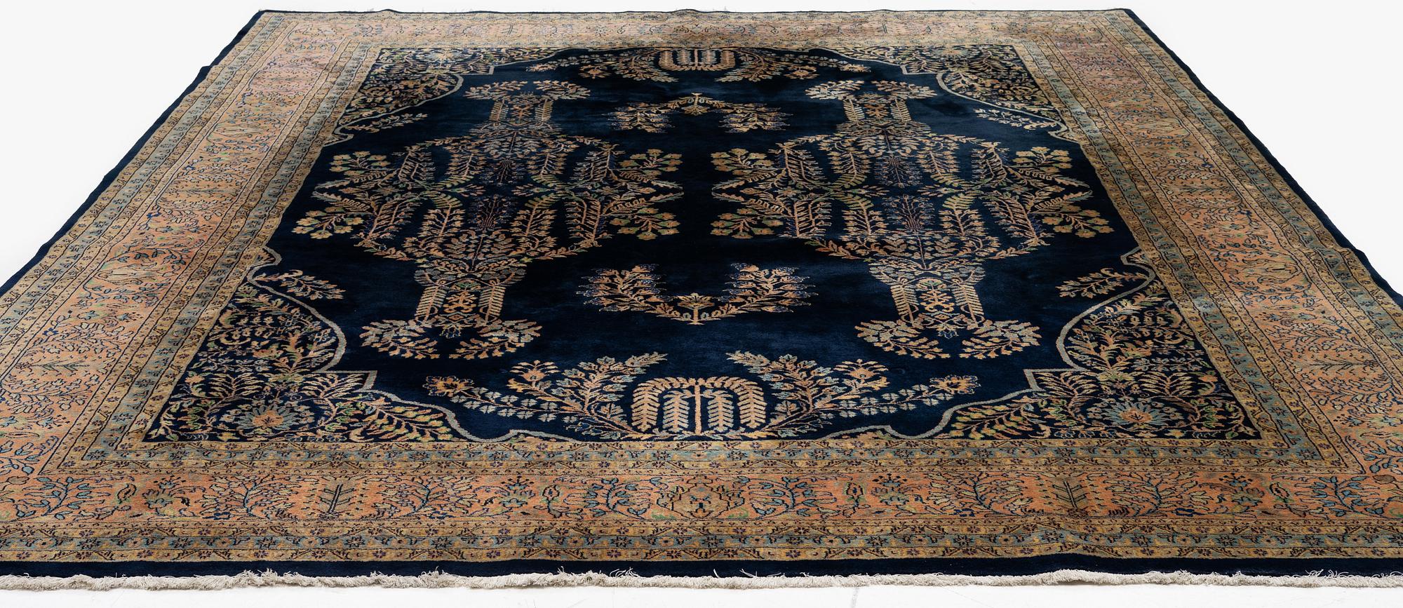 An India Carpet, c. 380 x 285 cm.