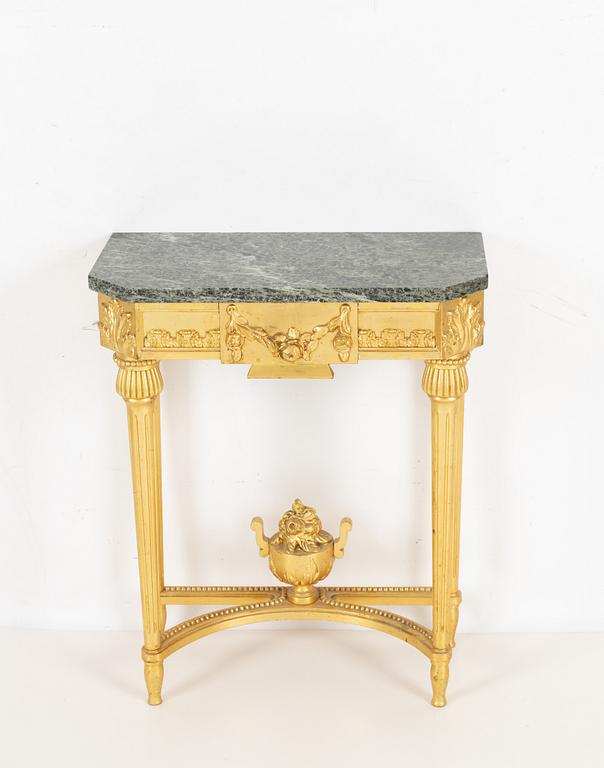 A Gustavian style console table and mirror, mid 20th century.