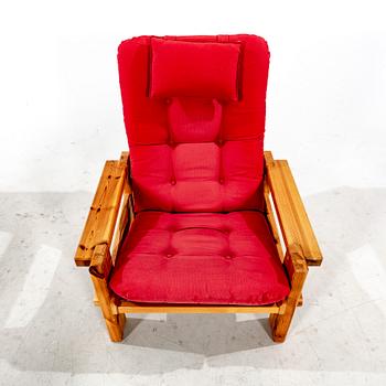 A pair of Yngve Ekström "Dymling" pine armchairs for Swdese 1970s.