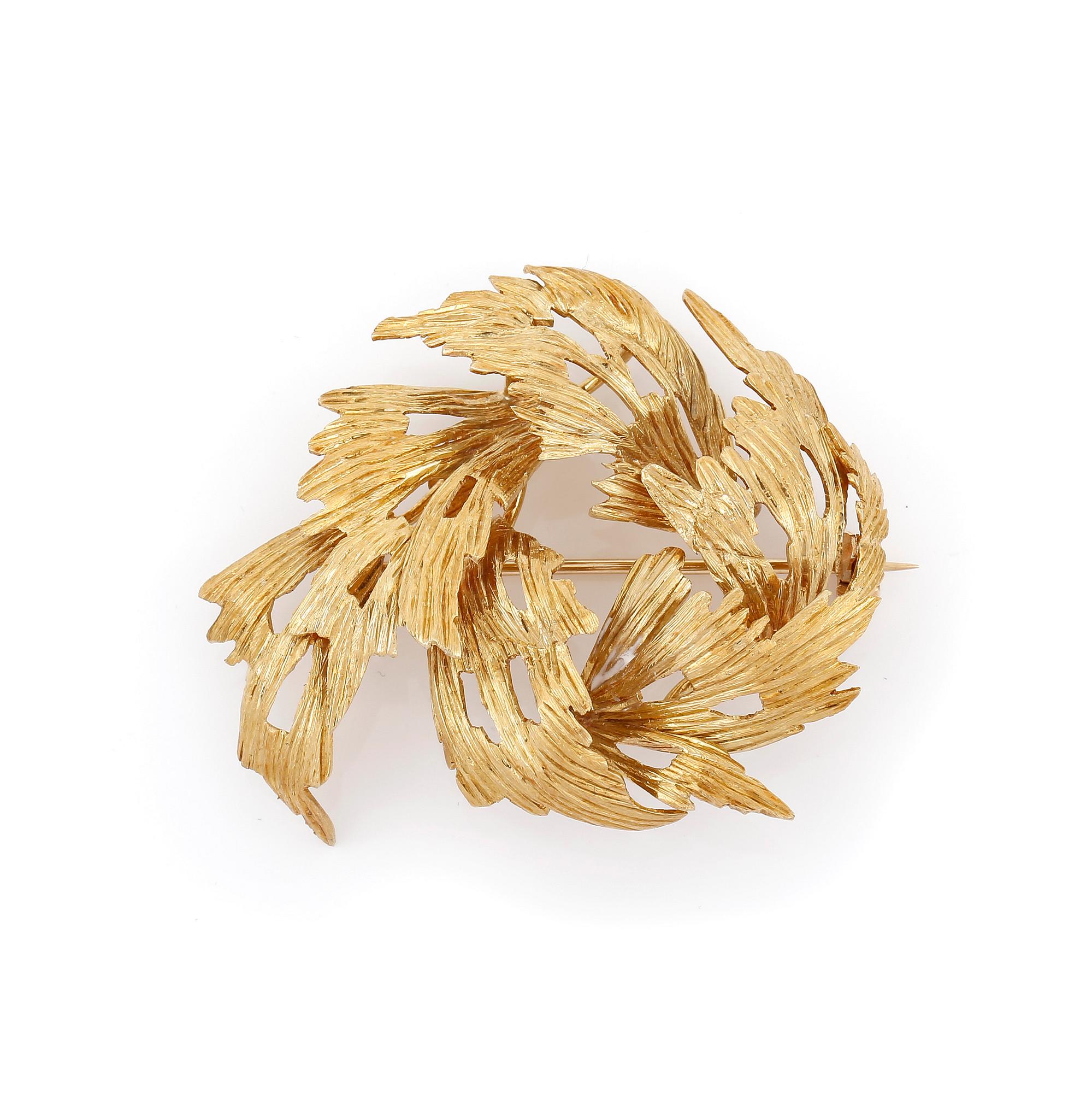 BROSCH, 18K guld. Total vikt 19 gram.