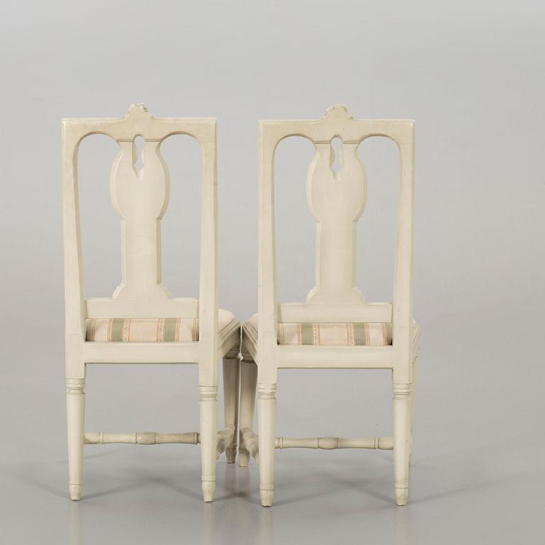 A piar of signed Swedish Gustavian chairs.