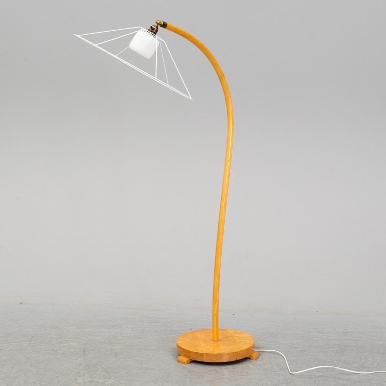 A Swedish Modern birch floor lamp, 1940's.