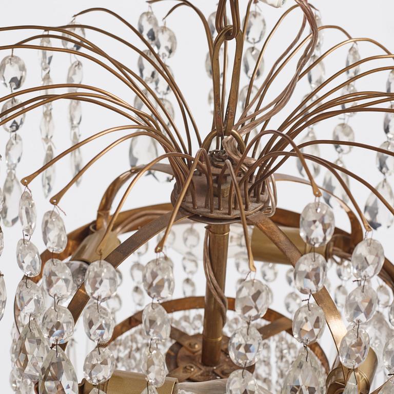 A gilt brass and cut glass nine-light Empire chandelier, first part of the 19th Century.
