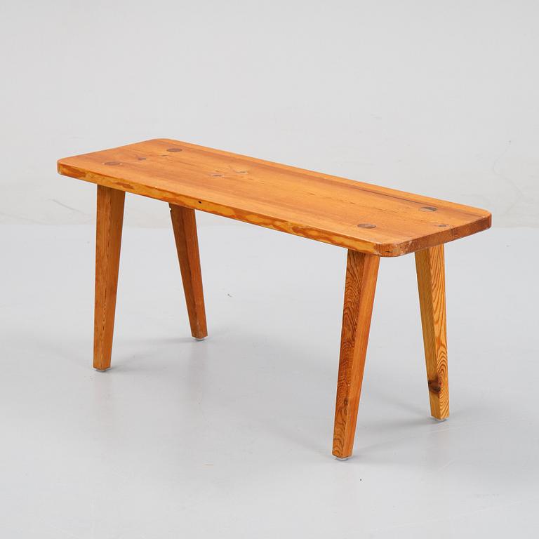A pinewood stool, second half of the 20th Century.