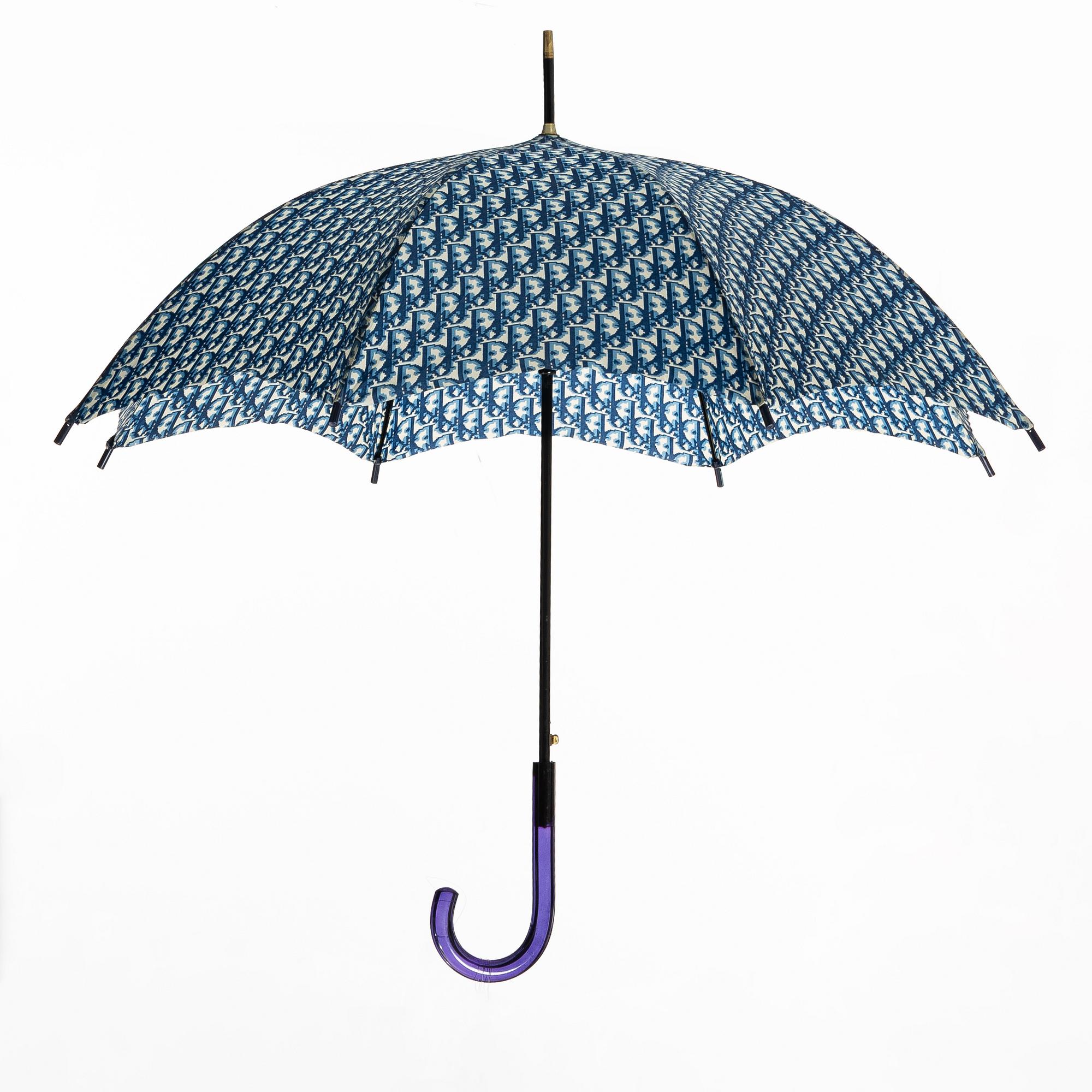 Christian Dior, aftonväska samt paraply.