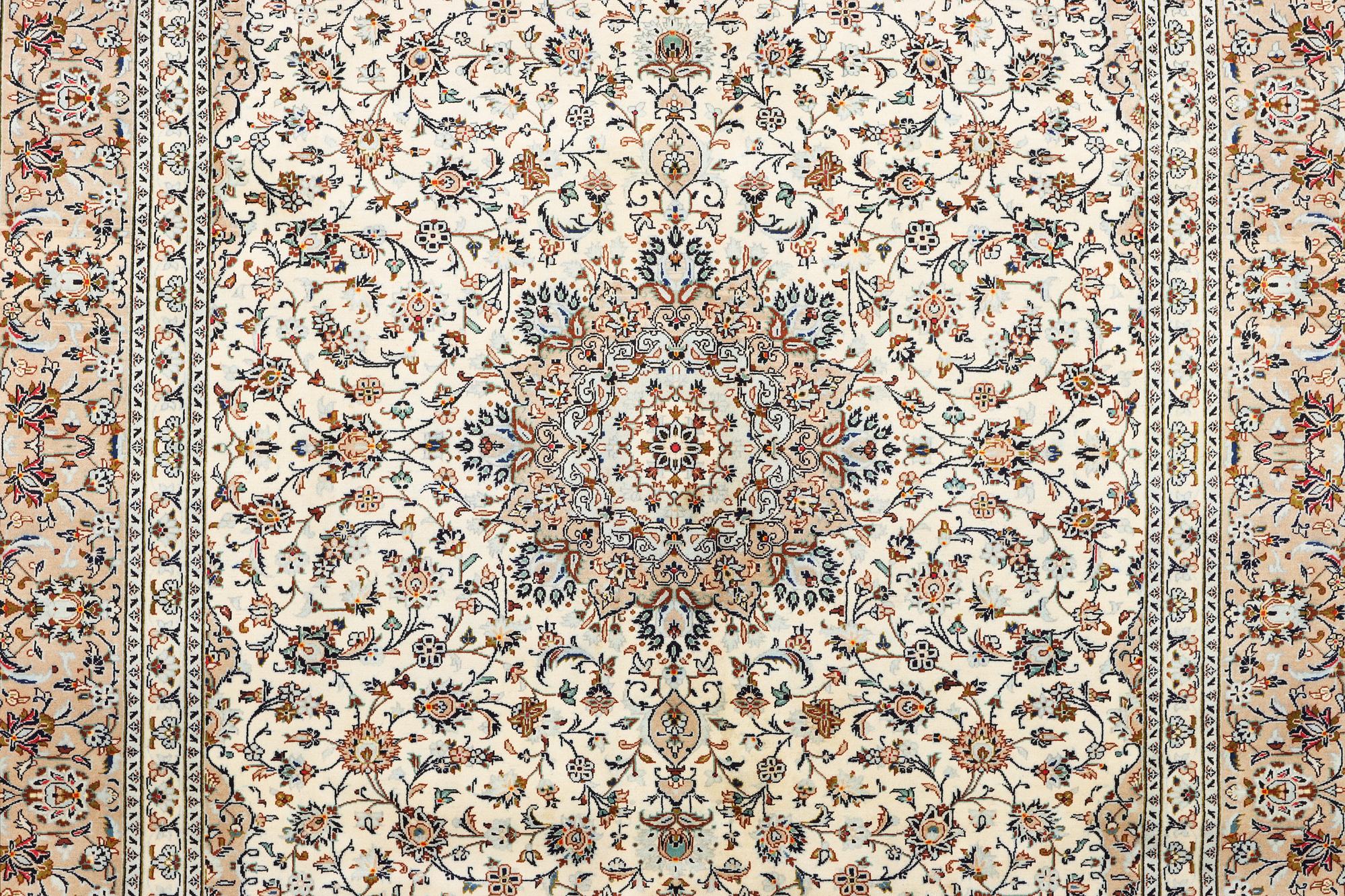 A Kashan carpet, c. 403 x 300 cm.
