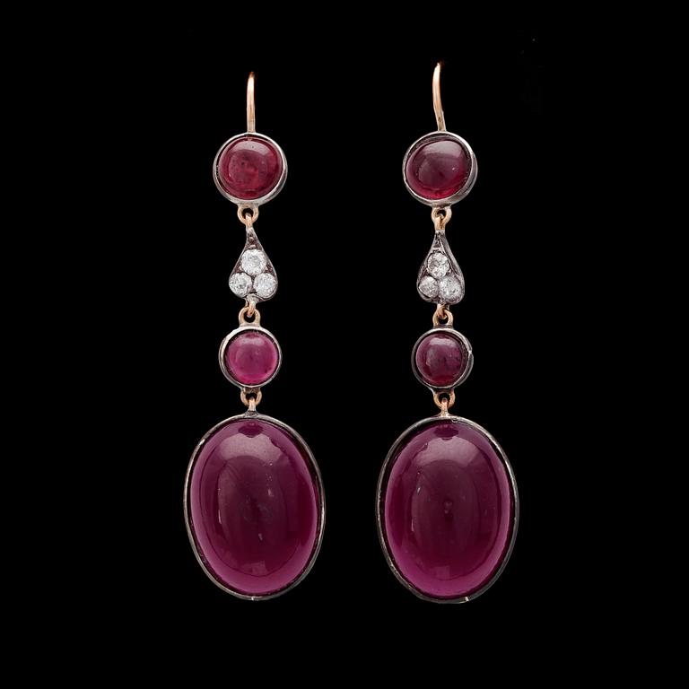 EARRIGNS, cabochon cut garnets and red paste (glasstones) and old cut diamonds.