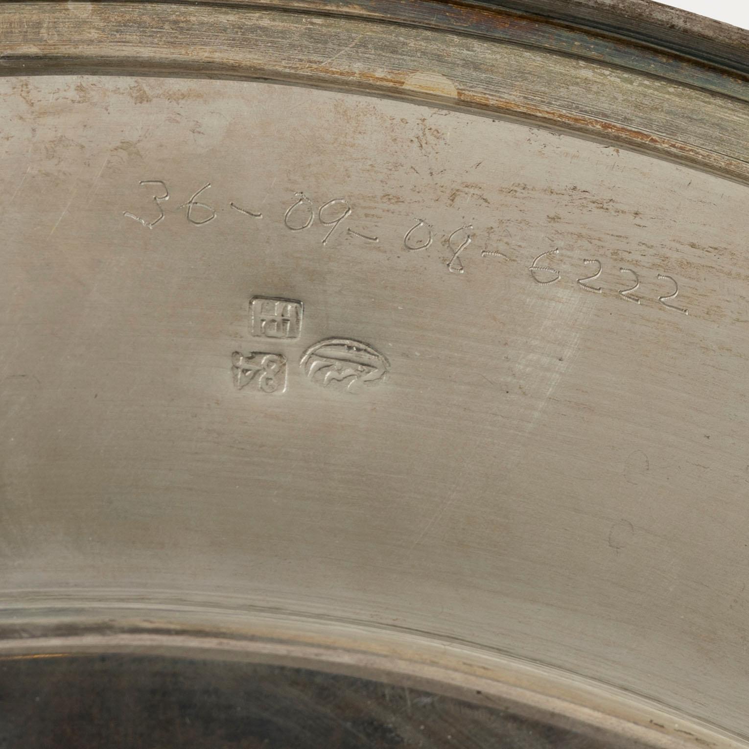 A pair of Persian silver plates, 20th century.