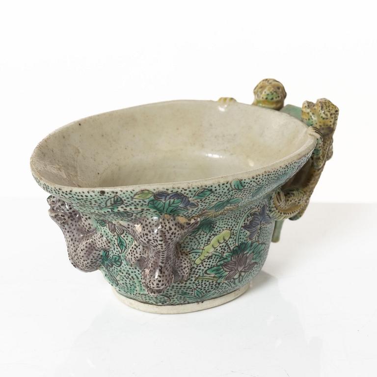 A famille verte bisquit wine cup, Qing dynasty, Kangxi (1662-1722).