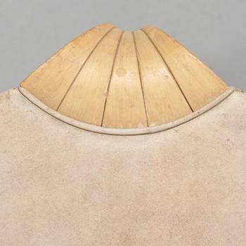 a "X600" stool by Alvar Aalto for Artek.
