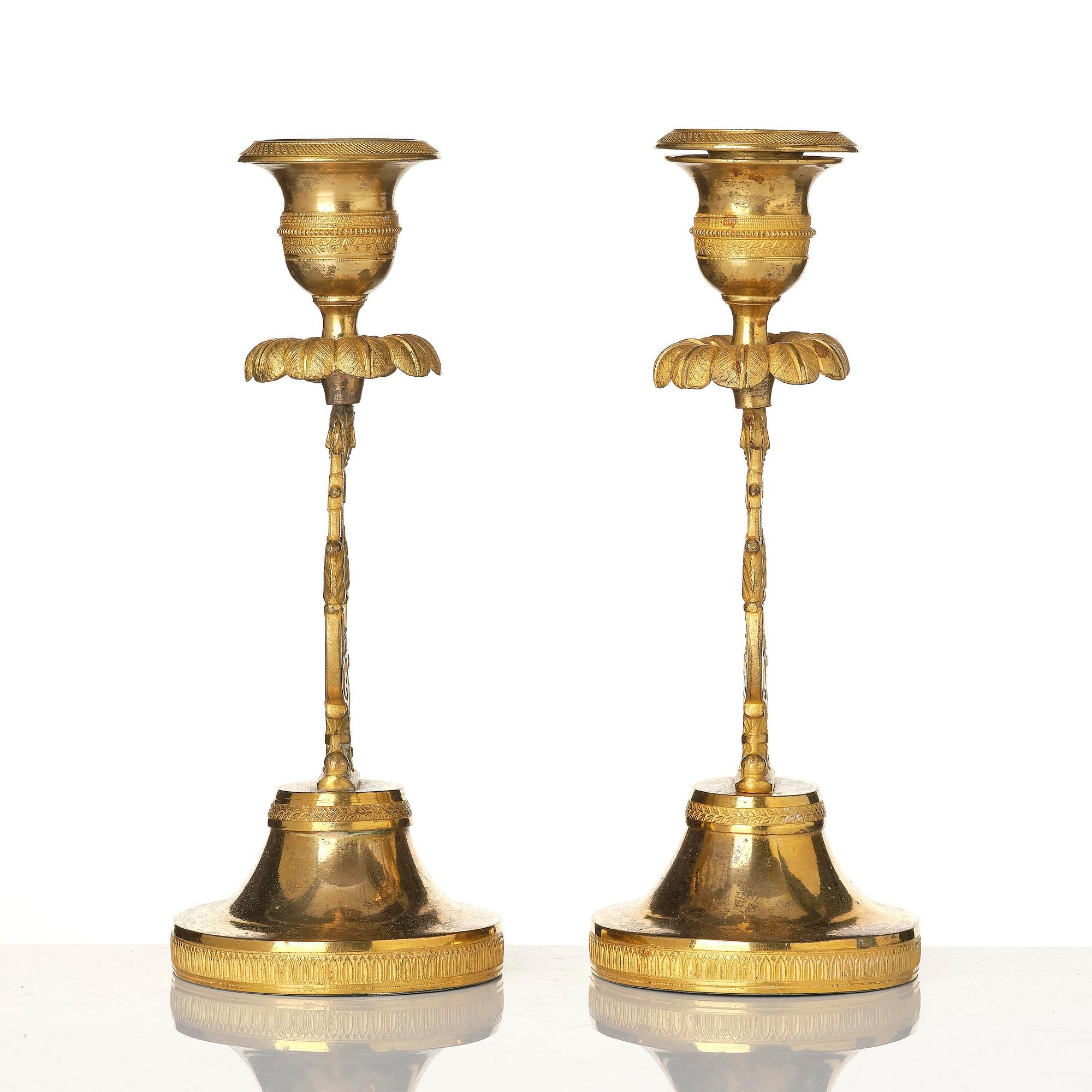 A pair of Swedish Empire ormula candlesticks.