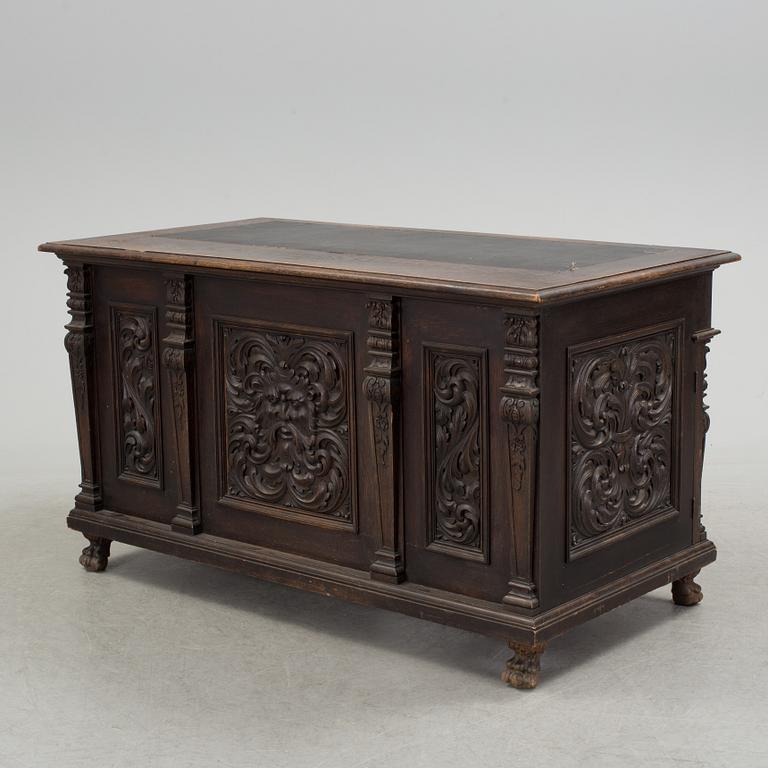 A Renaissance revival free standing writing desk, late 19th century.