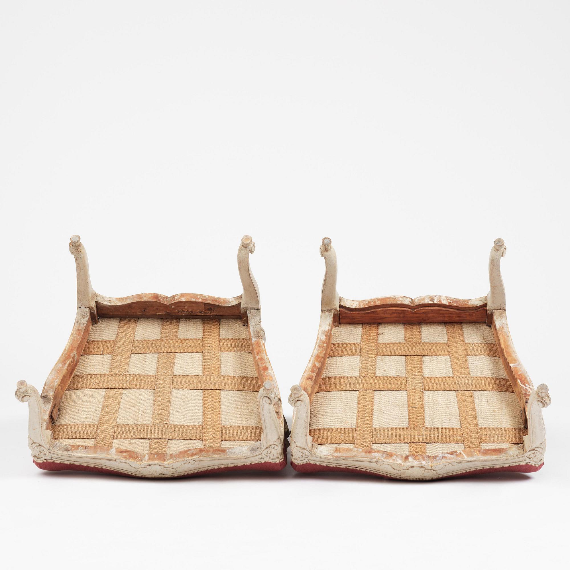 A large pair of Swedish Rococo armchairs in the manner of O Höglander (1750-1765).