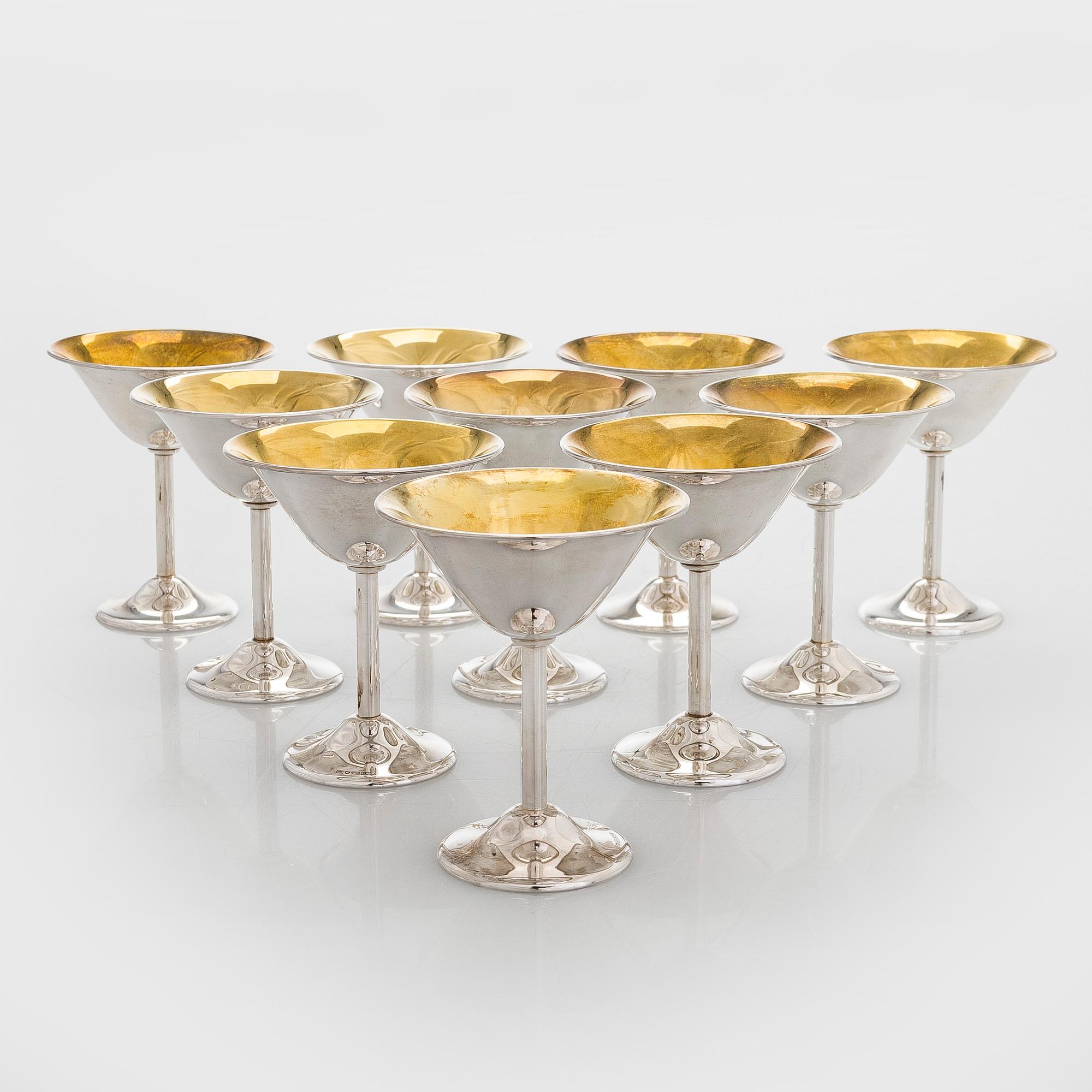 A 10-piece set of parcel-gilt silver beakers, Suomen Kultaseppä oy, Turku 1949.