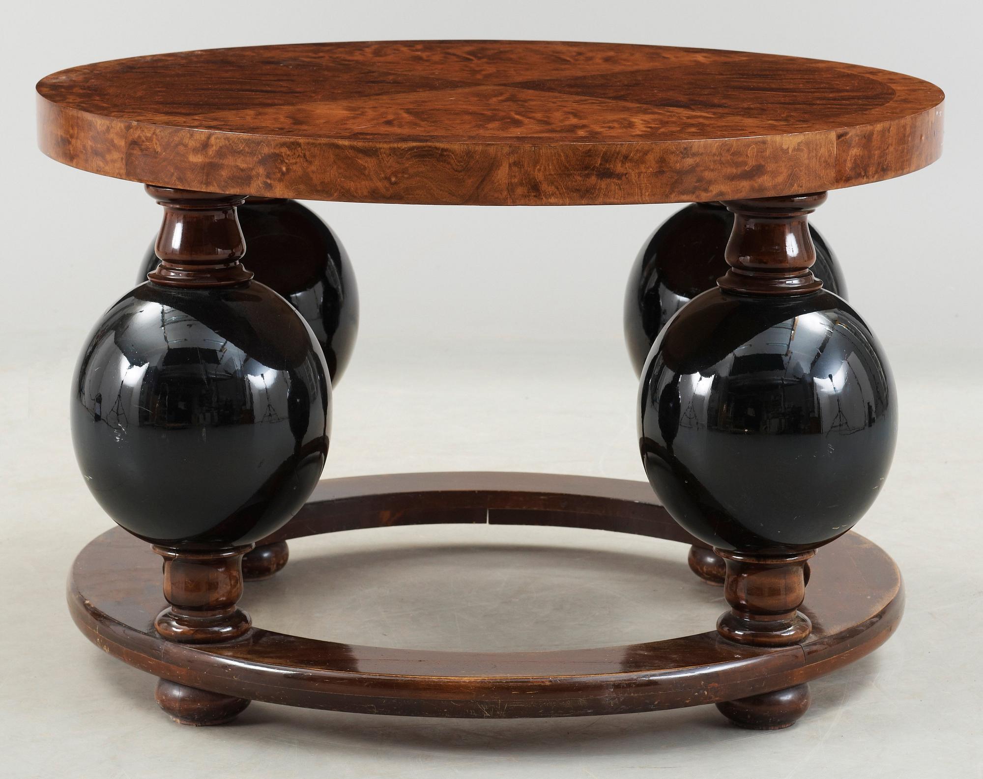 A stained birch and black lacquered sofa table, possibly by Erik 'Klot-Johan' Johansson, Reiners, Mjölby 1940's.