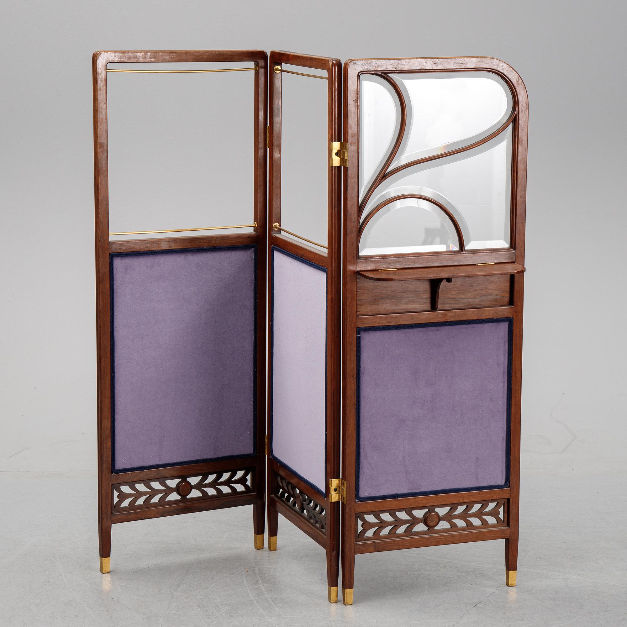 An early 20th century folding screen.
