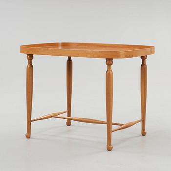 A Josef Frank mahogany side table, Svenskt Tenn, model 961.