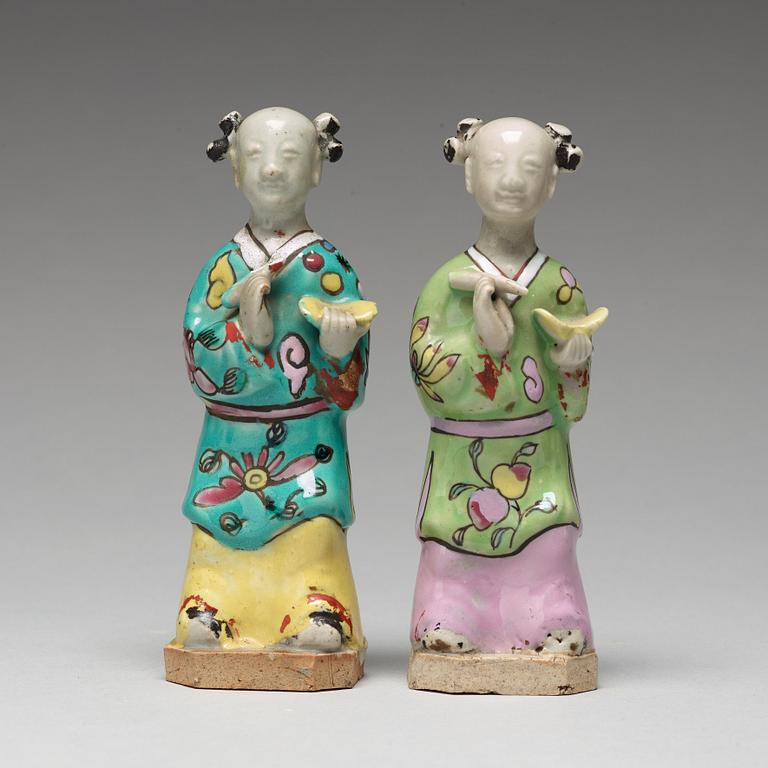 A group of eight famille rose figurines, Qing dynasty, 19th Century.