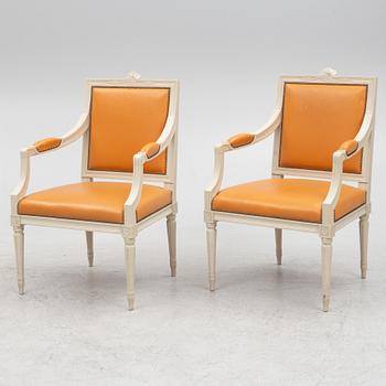 A pair of armchairs, Gustavian style, 20th century.