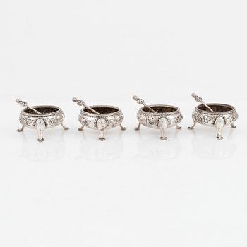 A set of four silver salt-cellars with silver spoons. Mark of Martin Hall & Company, Ltd, Sheffield 1870-71.