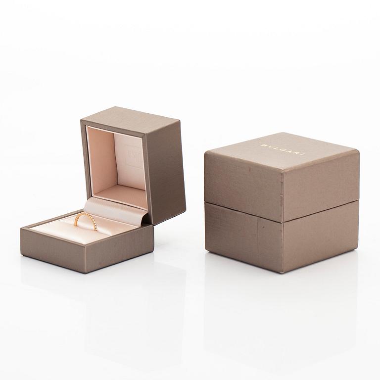 Bulgari, sormus, puoliallianssi, 18K kultaa ja timantteja.