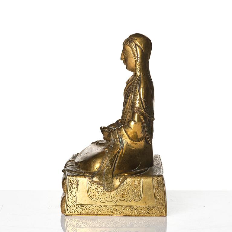 A gilt bronze sculpture of Arhat Ajita, Tibeto-Chinese, 18th century.