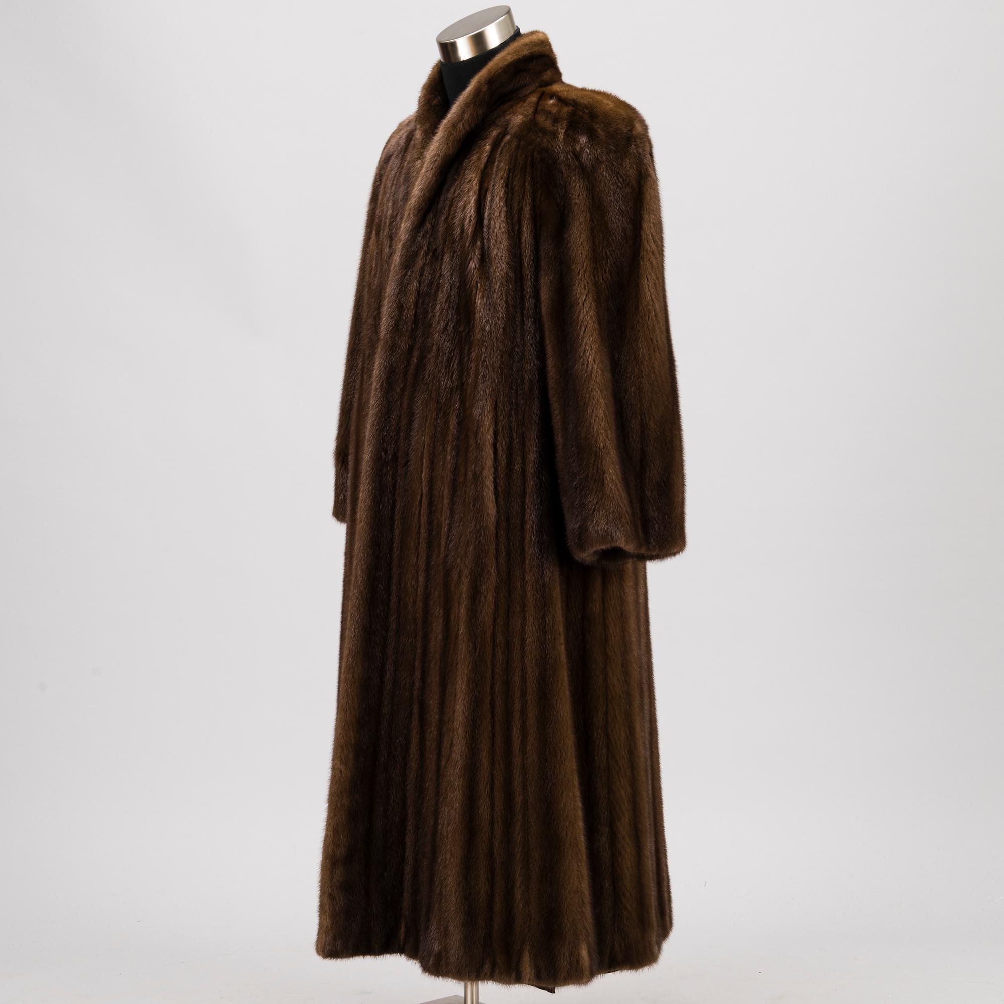A Long Brown Mink Coat by Grosvenor to Harrods.