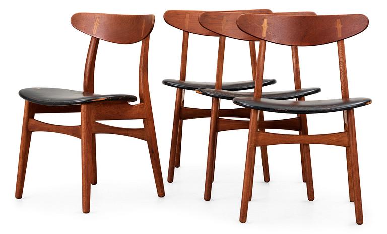 Four Hans J Wegner 'CH-30' teak and black leather chairs, Denmark, 1950-60's.