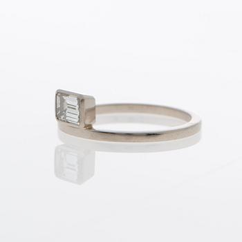 A RING, emerald cut diamond, 14K white gold.