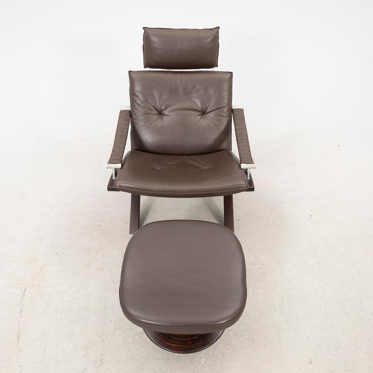 Åke Fribyter, an armchair and fotstool by Nelo, Knislinge, second half of the 20th Century.