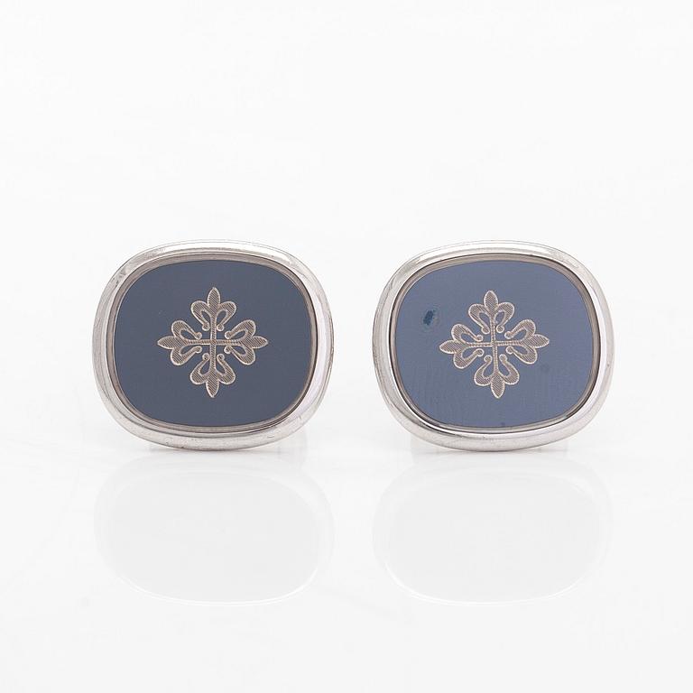 Patek Philippe, a pair of 18K whitegold 'Calatrava' cufflinks.