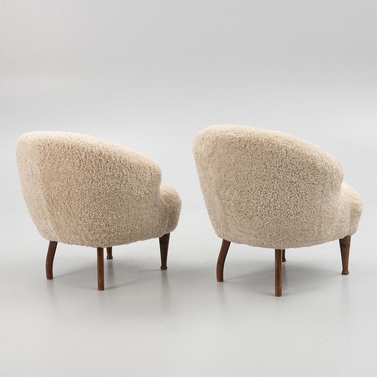 A pair of Swedish Modern armchairs, mid 20th century.