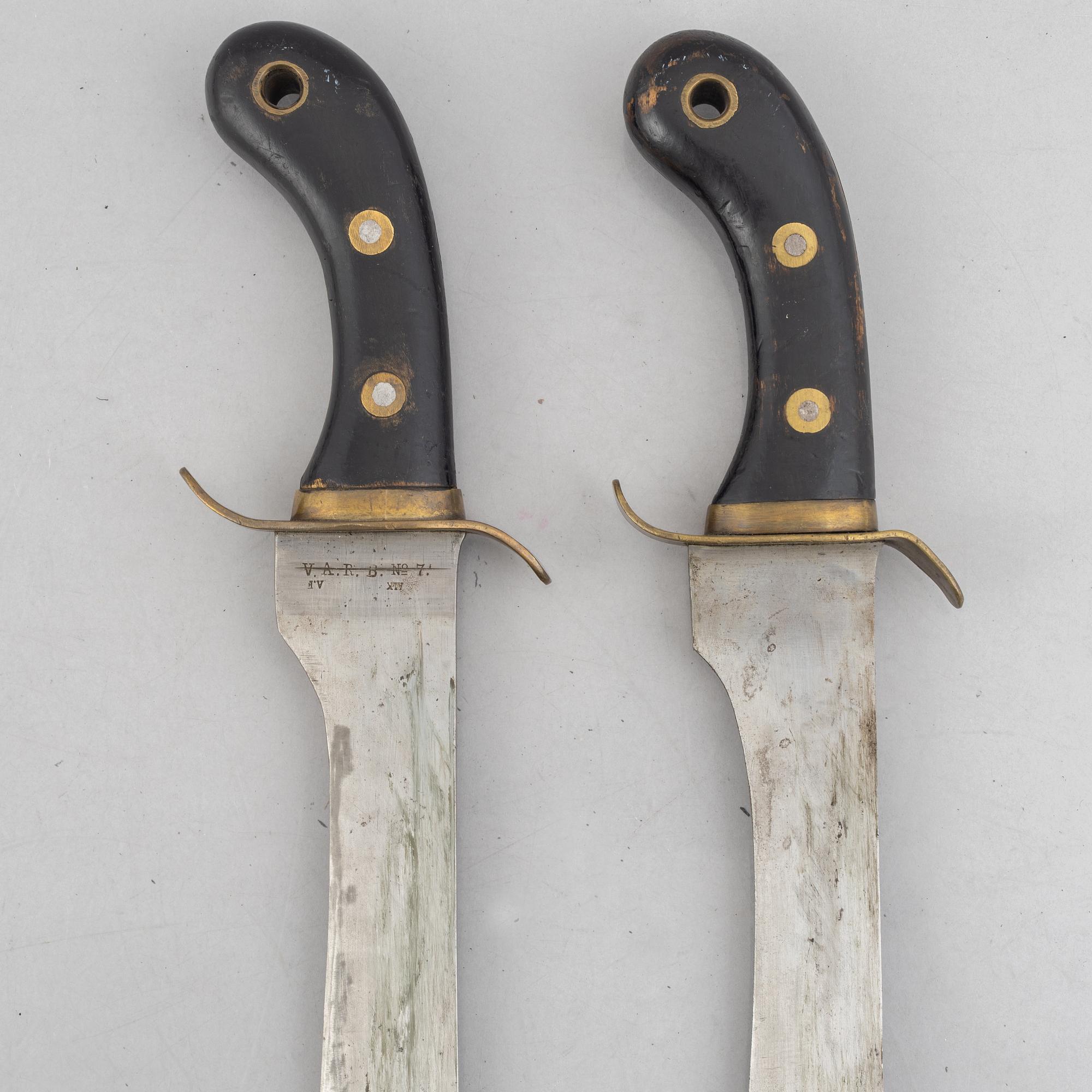 Two Swedish cutlasses 1848 pattern, with scabbards.