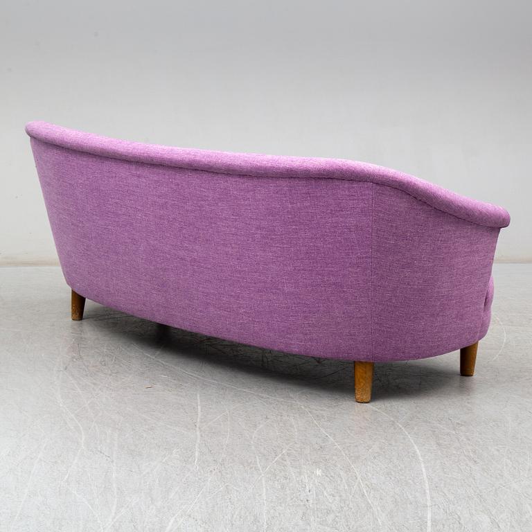 a Carl Malmsten sofa.