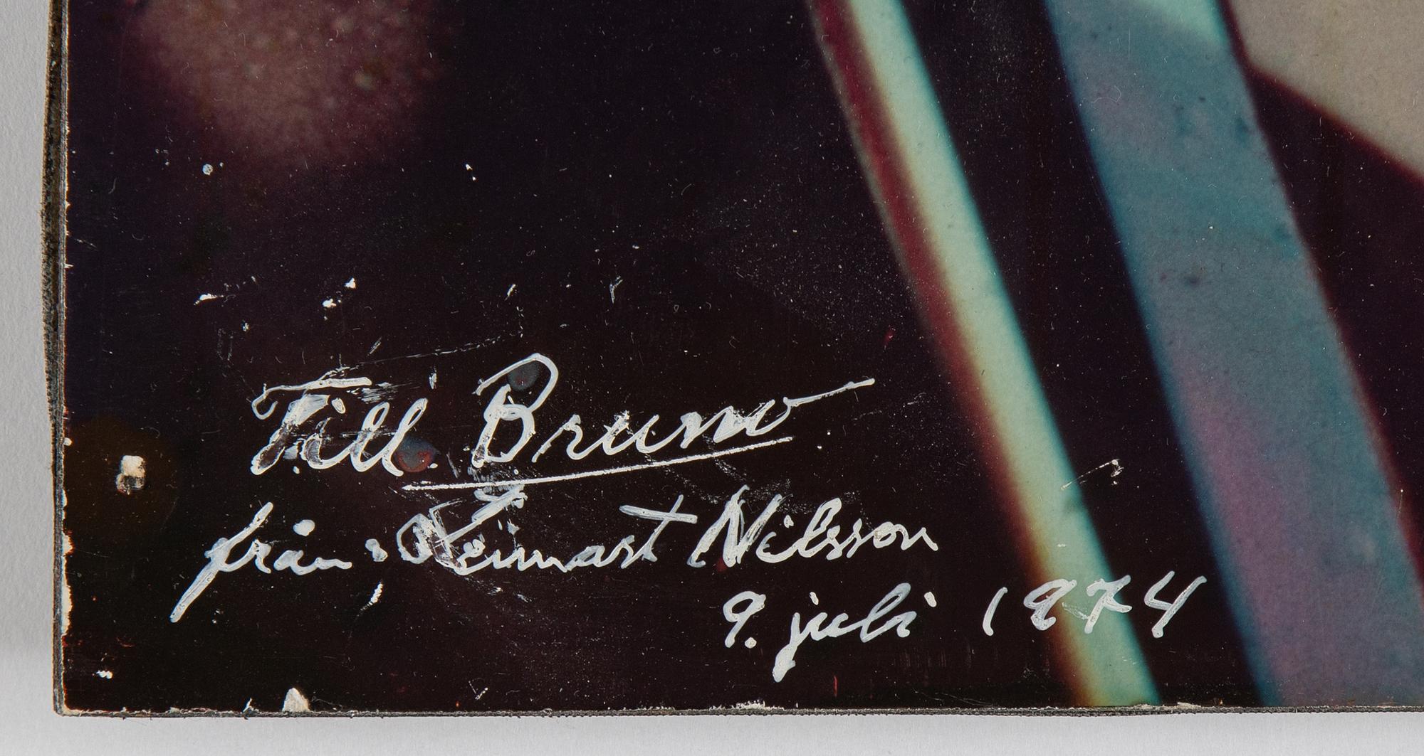 Lennart Nilsson, a photography on board, signed, with dedication and dated 1974.