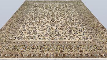 A Keshan carpet, approx. 388 x 285 cm.