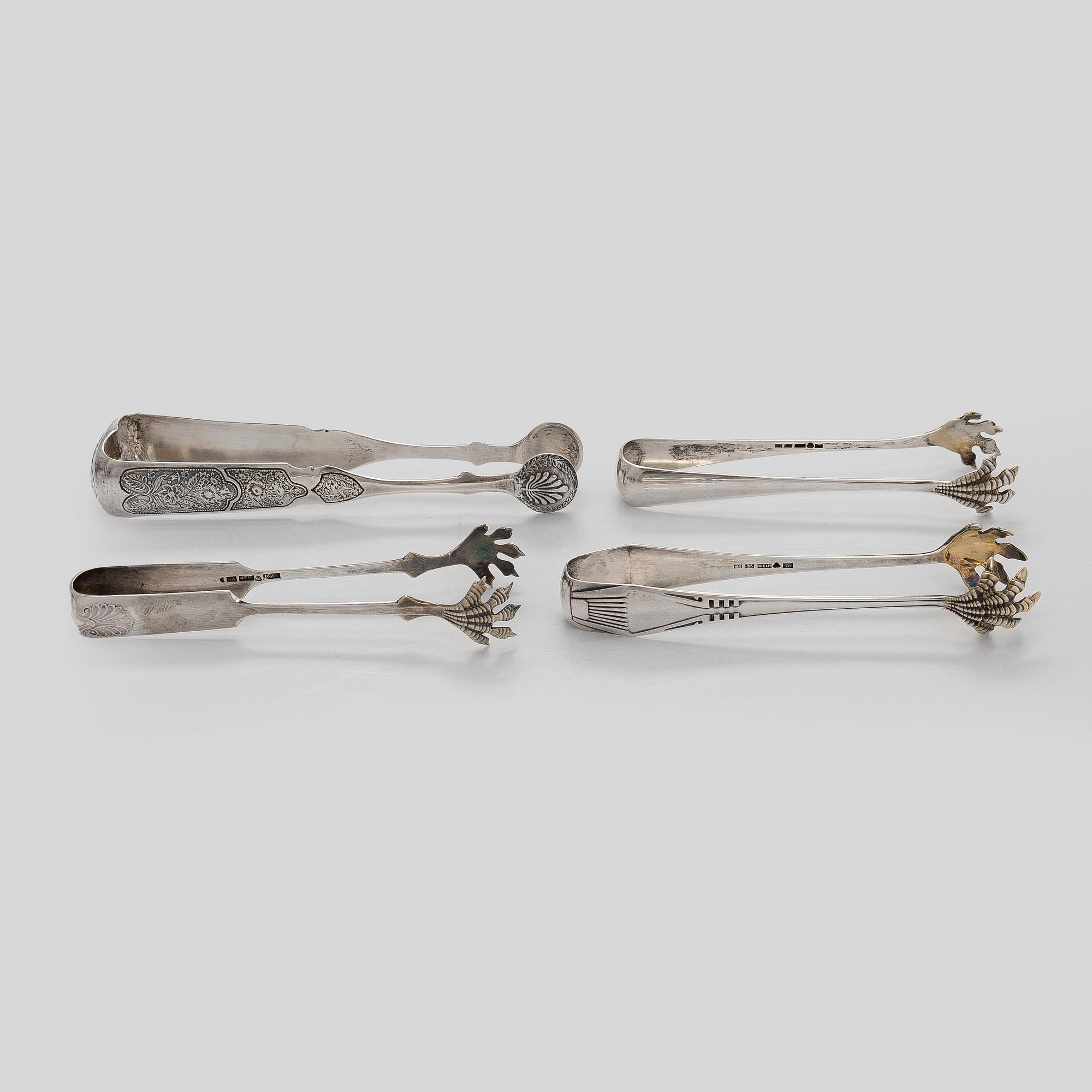 Servettringar 6 st och sockertångar 4 st, silver, olika stämplar 1893-1936.