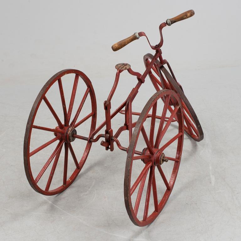 An early 20th century tricycle bike.