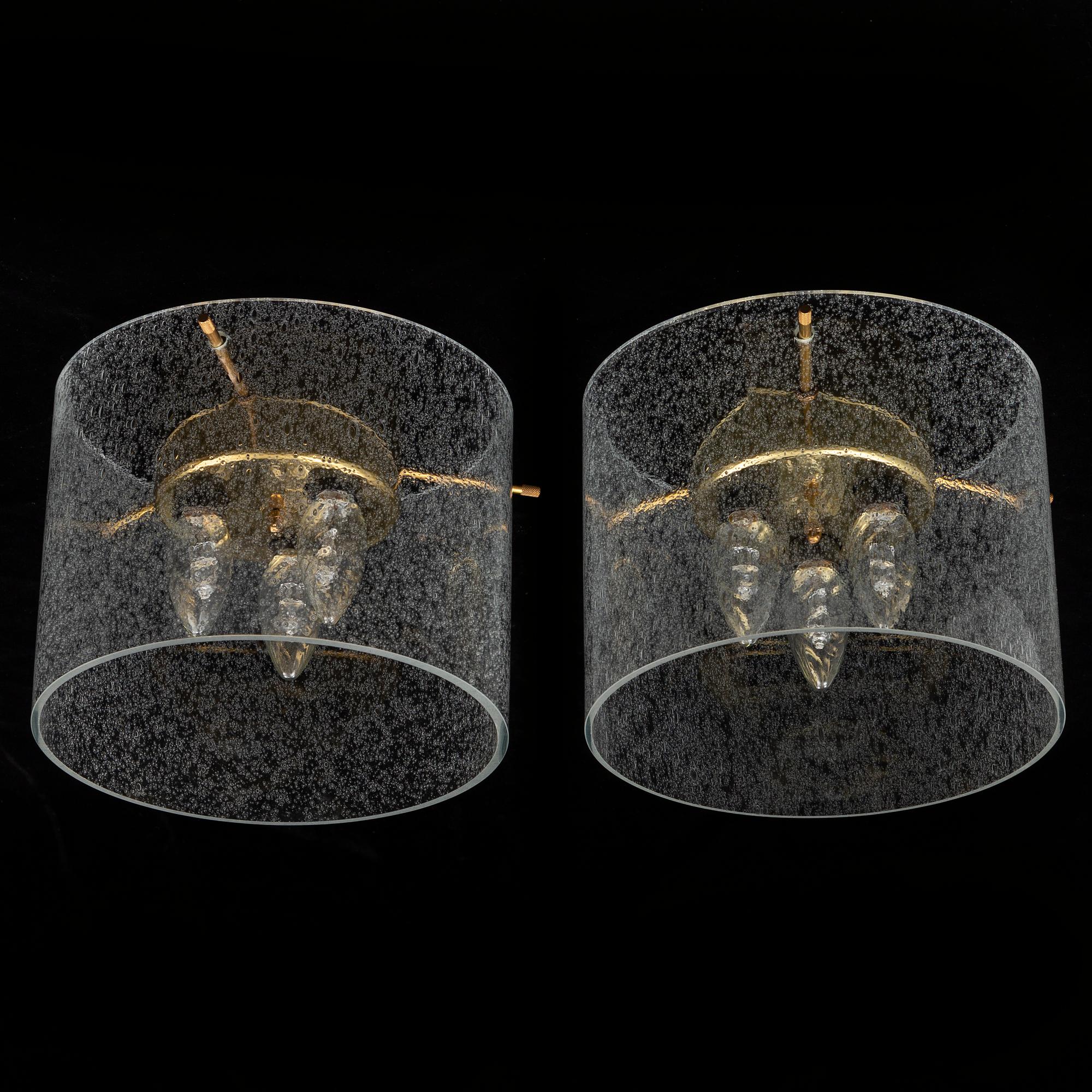 A pair of late 20th Century ceiling light by Kjell Munch.