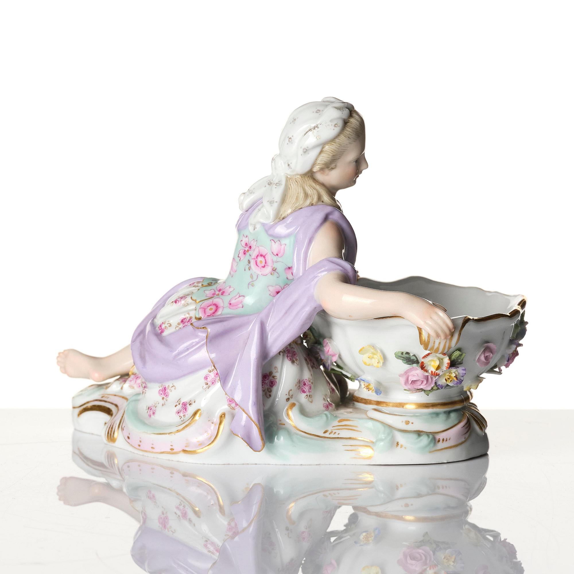 A pair of porcelain salt cellars, Meissen, Germany, late 19th century.