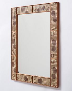 Josef Frank, a snakeskin framed mirror, Firma Svenskt Tenn, Sweden, executed in 1940.