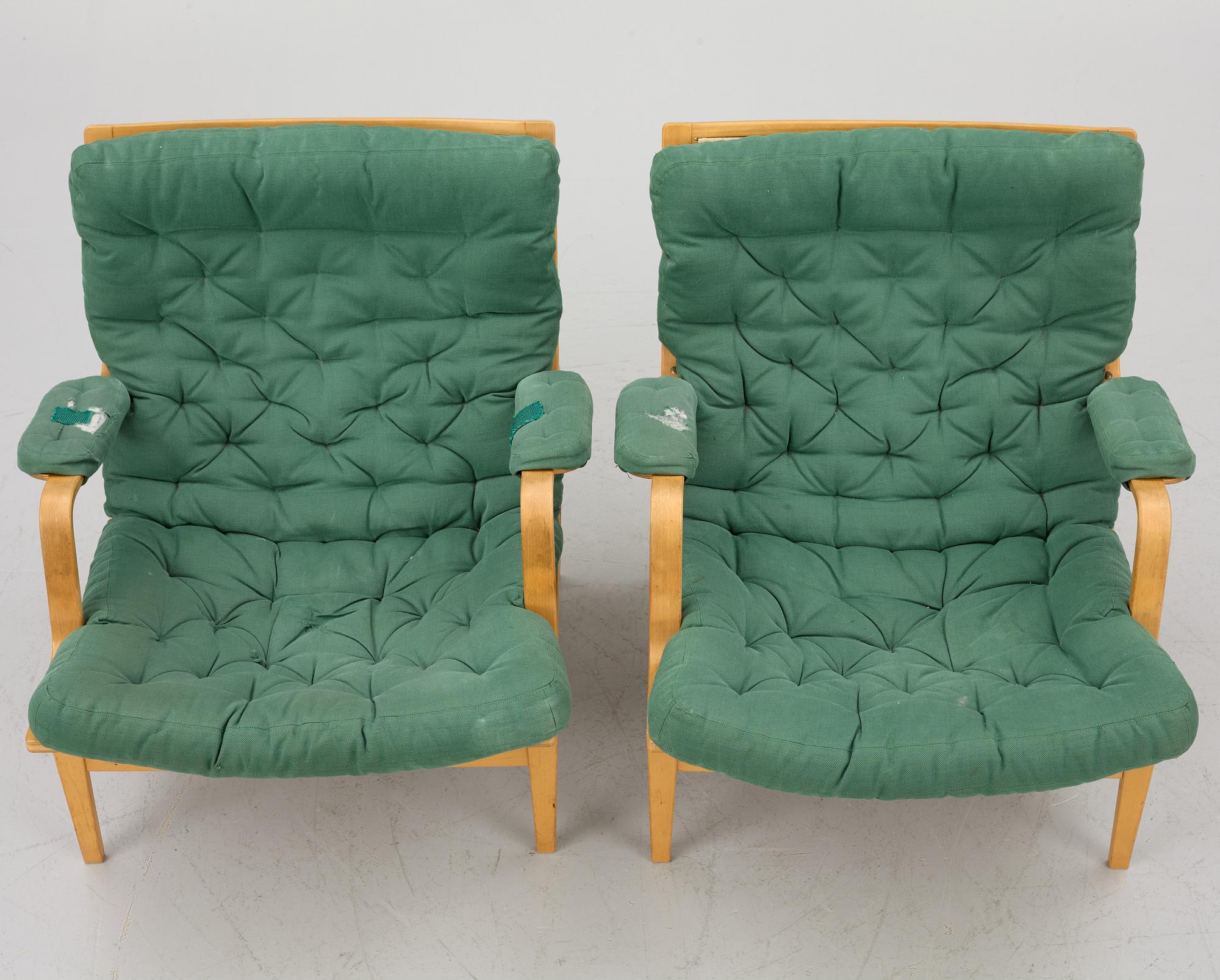 Bruno Mathsson, a pair of "Ingrid" armchairs, Dux, Sweden, second half of the 20th century.