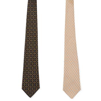 464. A set of two silk ties by Hermès.