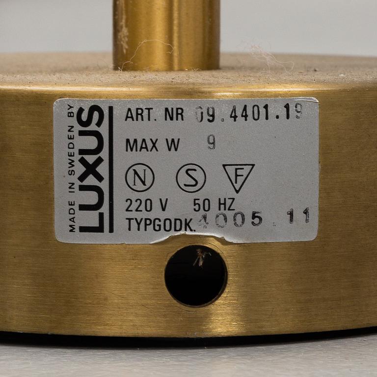 UNO & ÖSTEN KRISTIANSSON, a pair of brass wall light from Luxus.