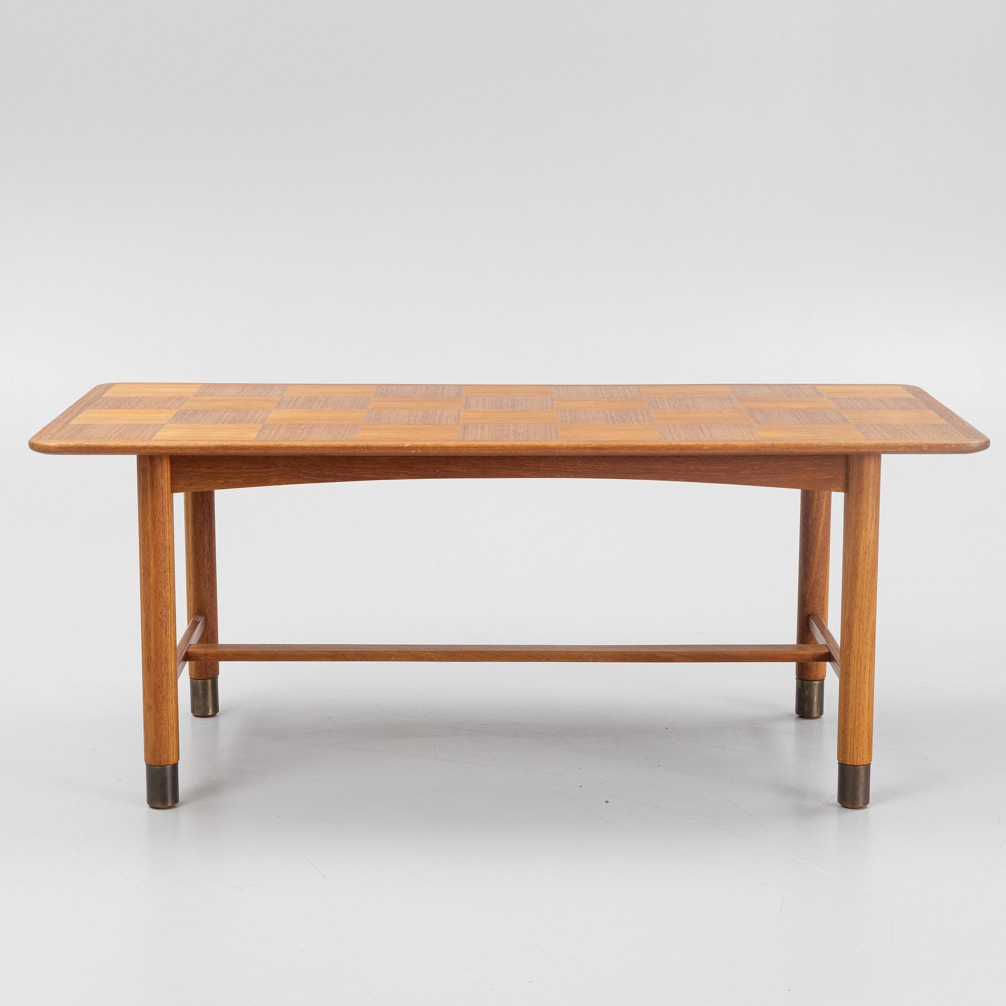A Teak Veneer Coffee Table, mid 20th century.