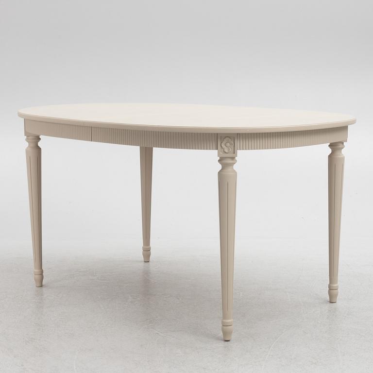 A Gustavian Style Dining Table and 10 Chairs, second half of the 20th Century.